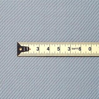 Rotary ruler aligned on fabric