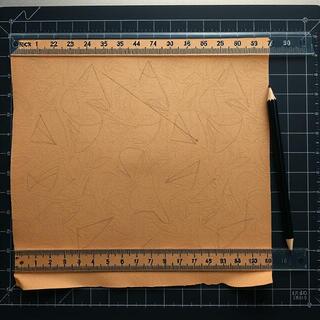 Marking guidelines on pattern paper with pencil